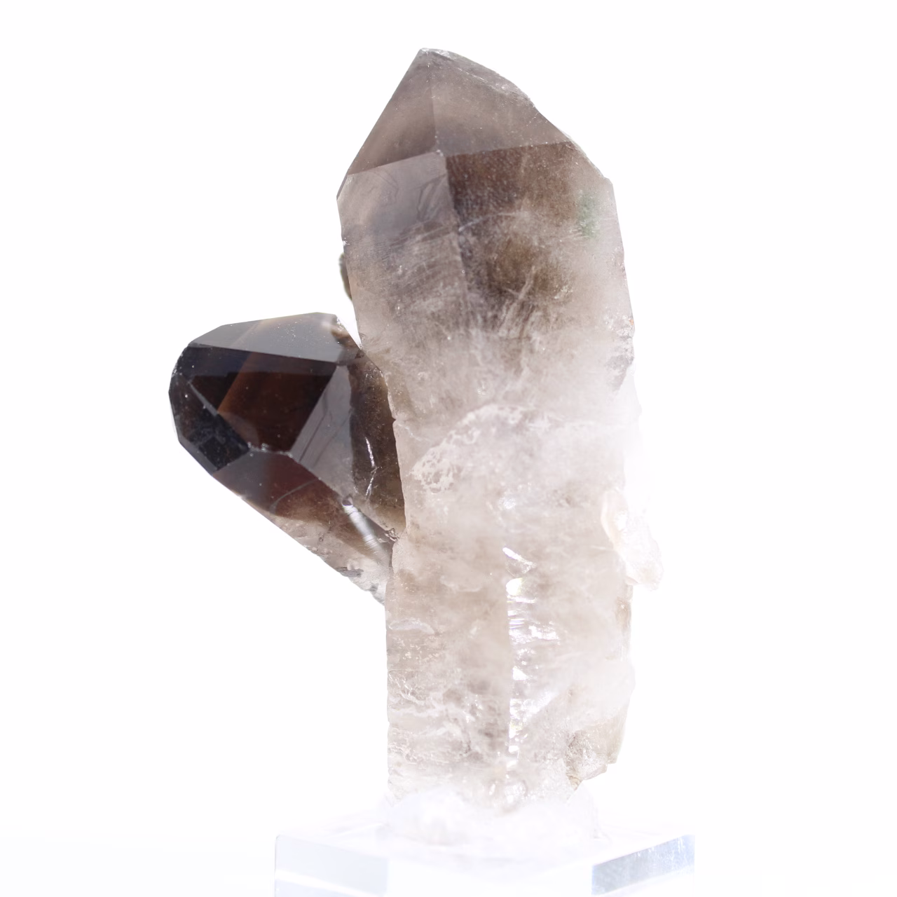 Morion quartz from Brazil, small crystallized point on a stand
