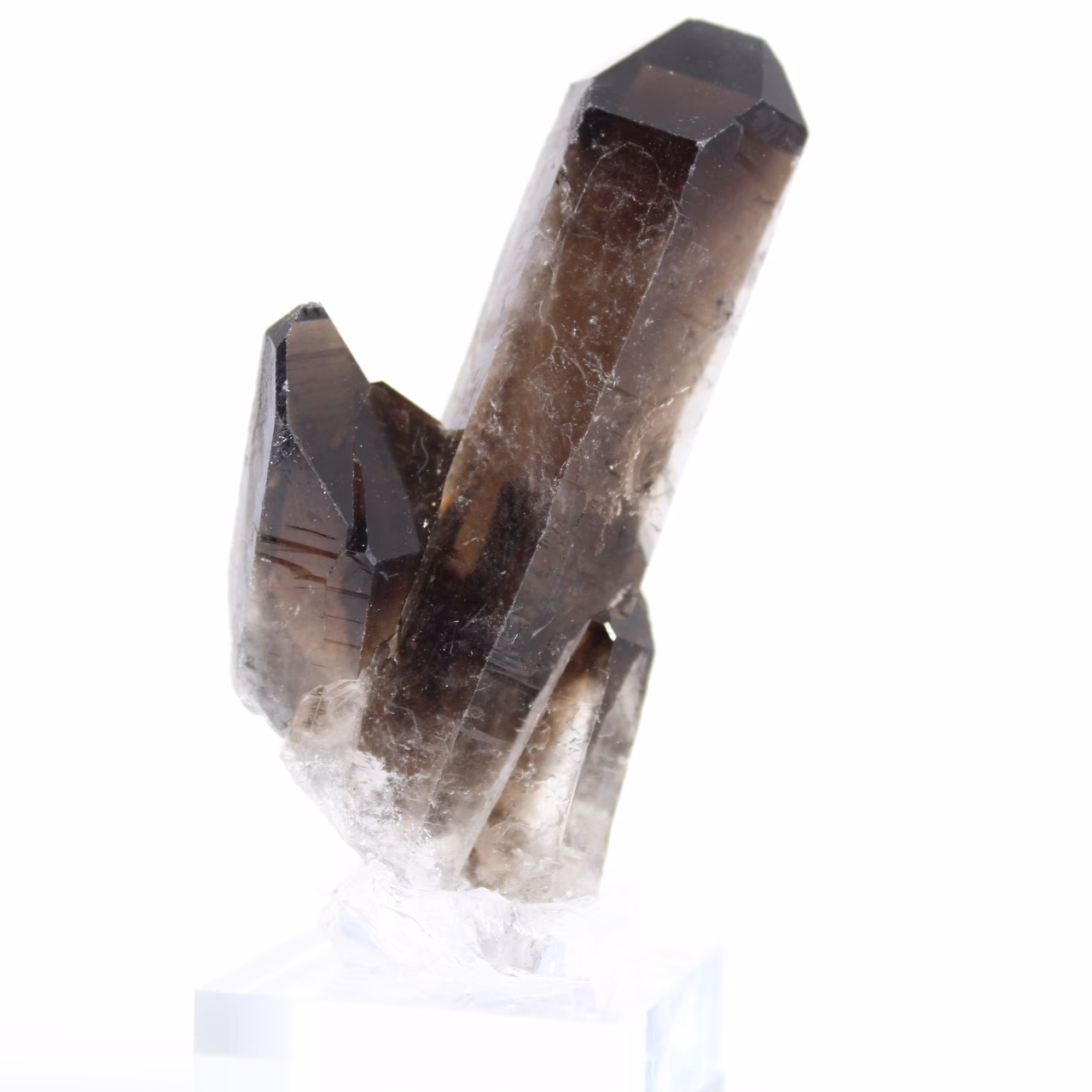 Small-size morion quartz from Brazil, slender point with stand