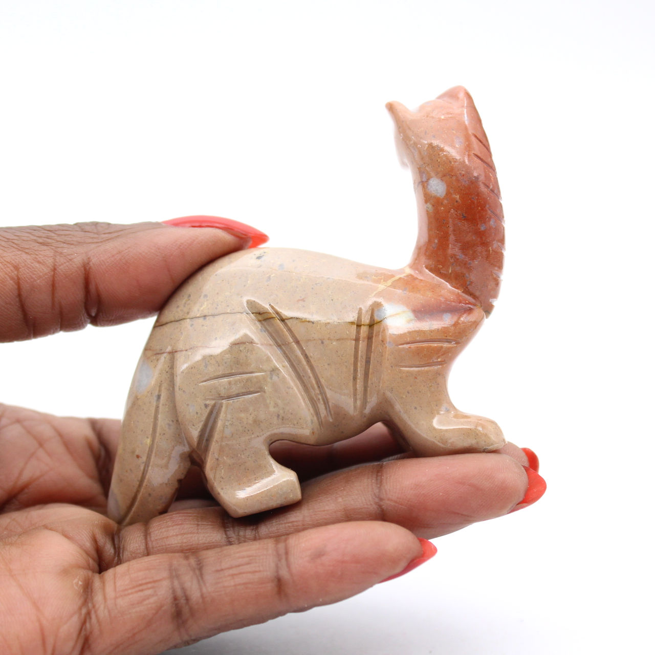 Steatite diplodocus: Bolivian dinosaur sculpture