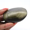 Mexican golden obsidian in a small 70 g polished pebble - 0