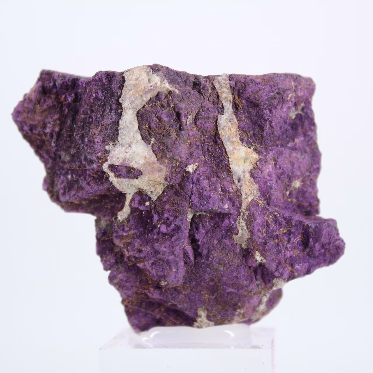 Natural Purpurite from Portugal mounted on stand
