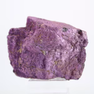 Raw Purpurite specimen from Portugal on stand