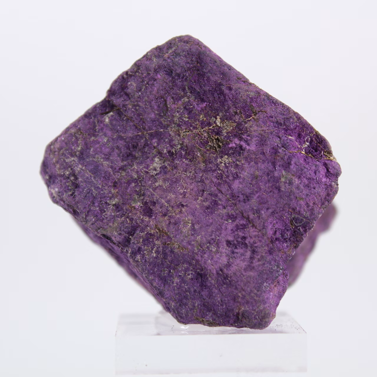 Raw Portuguese Purpurite mounted on stand for collection